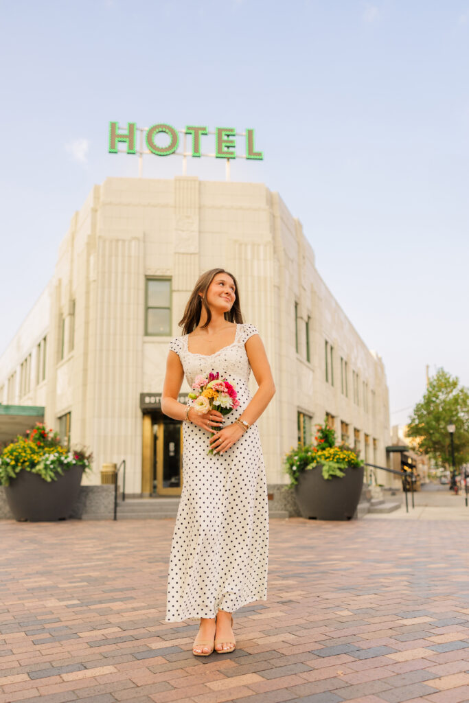 Urban senior portrait session at Bottleworks Hotel in Indianapolis